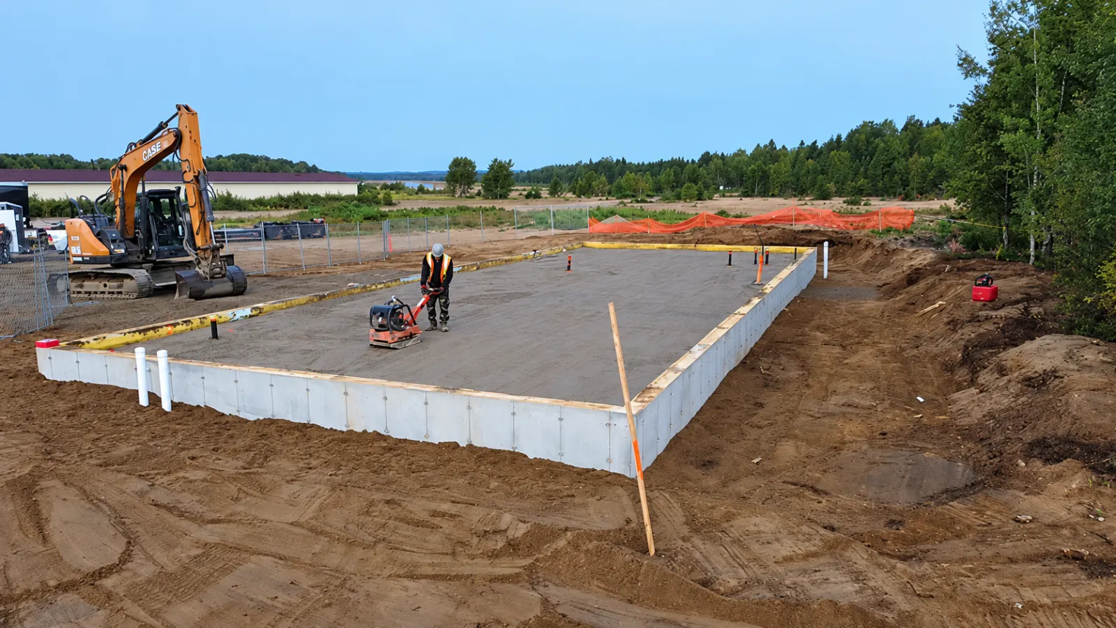 Compactage sur une dalle de fondation commerciale